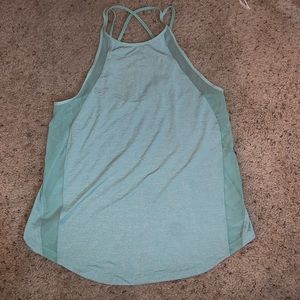 Lululemon size 8 turquoise tank top with cross back and side mesh ✨